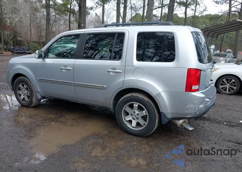 2010 Honda Pilot Touring z USA, uszkodzony, nr VIN 5FNYF4H94AB026325